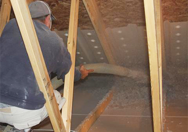 Cellulose insulation installation by Northern Windows, Siding, Roofing and Insulation